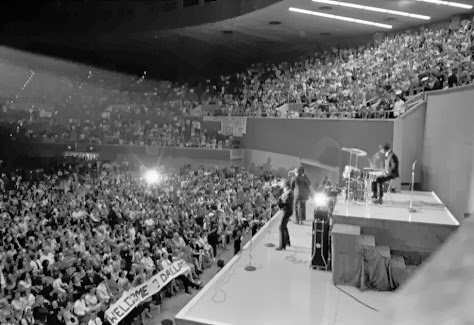 The Beatles perform at the Memorial Coliseum in Dallas, Texas, Sept. 18, 1964 on their second U.S. tour. On drums, right, is Ringo Starr.