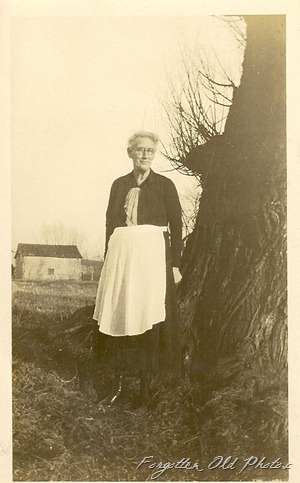 Lady with apron PR Antiques