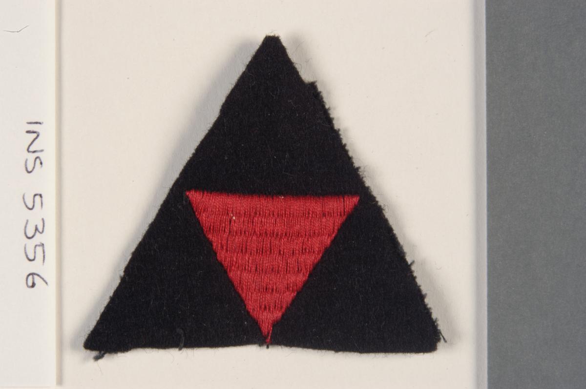 British Army formation badge for 3rd Infantry Division (the 'Iron Division') which landed as the left flank division around Ouistreham on D-Day, 6 June 1944