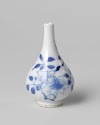 Miniature pear-shaped bottle vase with flowering plants