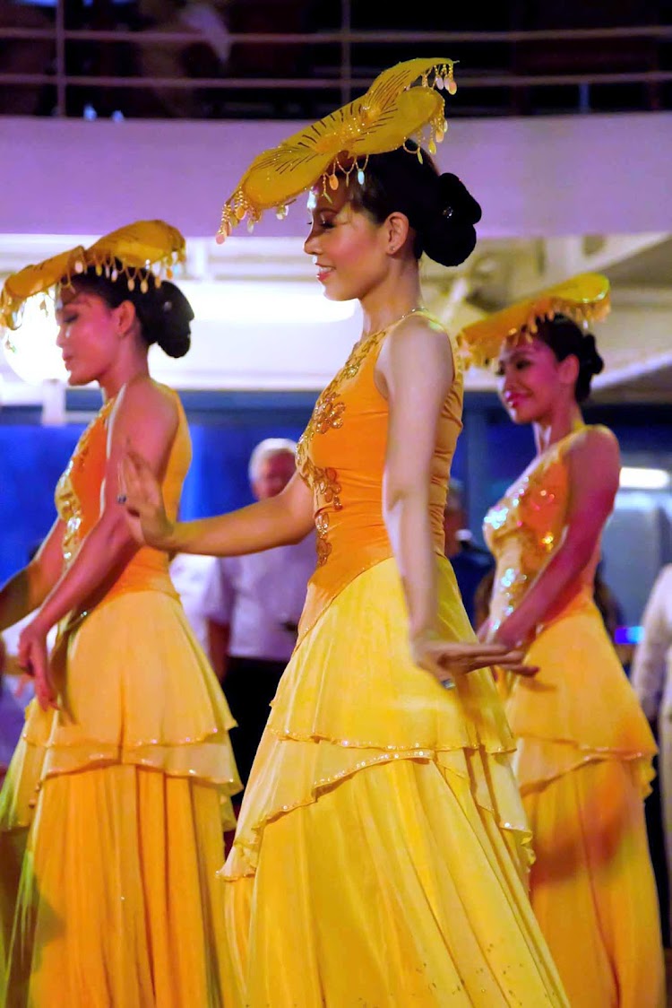 Get immersed in the music and dances of Vietnam with the Ho Chi Mihn Vietnamese Show aboard an Azamara cruise.