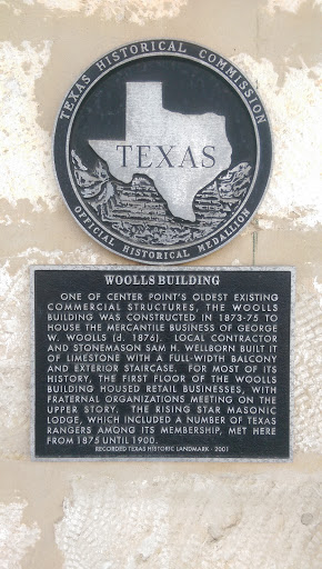Woolls Building Historical Plaque