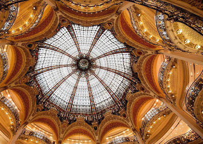The ornate, stained glass dome found above the perfume department in Paris' Galleries Lafayette department store.