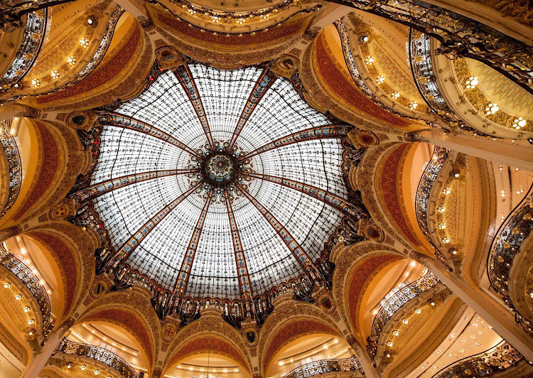 The ornate, stained glass dome found above the perfume department in Paris' Galleries Lafayette department store.