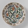 Dish with stylized flowering plants