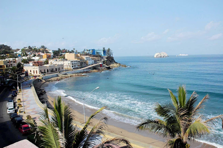 South Mazatlan beach and islands, with morning waves, along Sinaloa, Mexico.