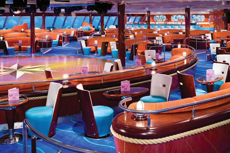 Let Norwegian Pearl's Spinnaker Lounge put you in a partying mood with its hip interiors and dance floor.