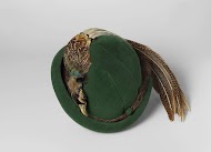 Cloche hat with a pheasant pelt