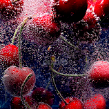 Cherries in water by Roman Kolodziej -  