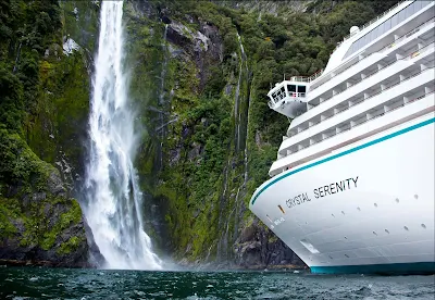View gorgeous waterfalls up close when Crystal Serenity takes you through Milford Sound in New Zealand.
