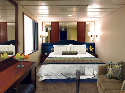 Centrally located on deck 6, Oceania's 143-square-foot E Level Ocean View staterooms are awash in natural sunlight from the expansive window. Features include a vanity desk with chair, refrigerated mini-bar,   breakfast table, Bulgari amenities, flat-screen TV with live satellite and twice-daily maid service.