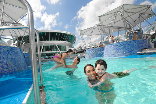 Grandeur-of-the-Seas-pool-family - There's plenty of family fun in the sun at Grandeur of the Seas' main swimming pool.