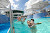 There's plenty of family fun in the sun at Grandeur of the Seas' main swimming pool.