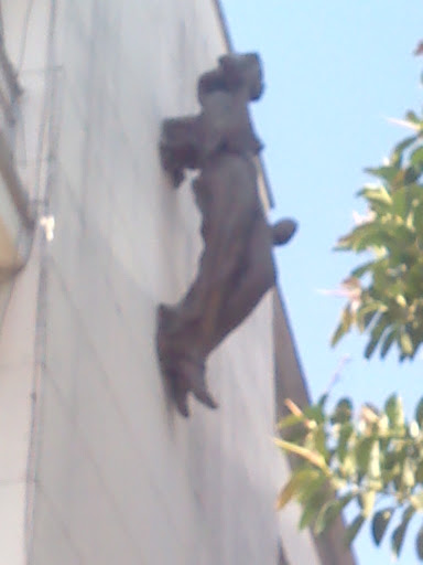 Flying Statue on the Wall