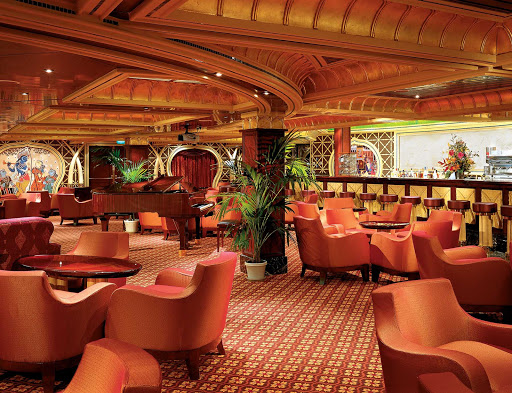 Enjoy an evening of drinks and live music in the Ivory Club when you sail the Caribbean with Carnival Glory.