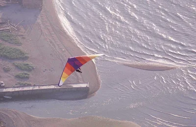 Hang gliding on the beach, Gaspesie, Quebec. 