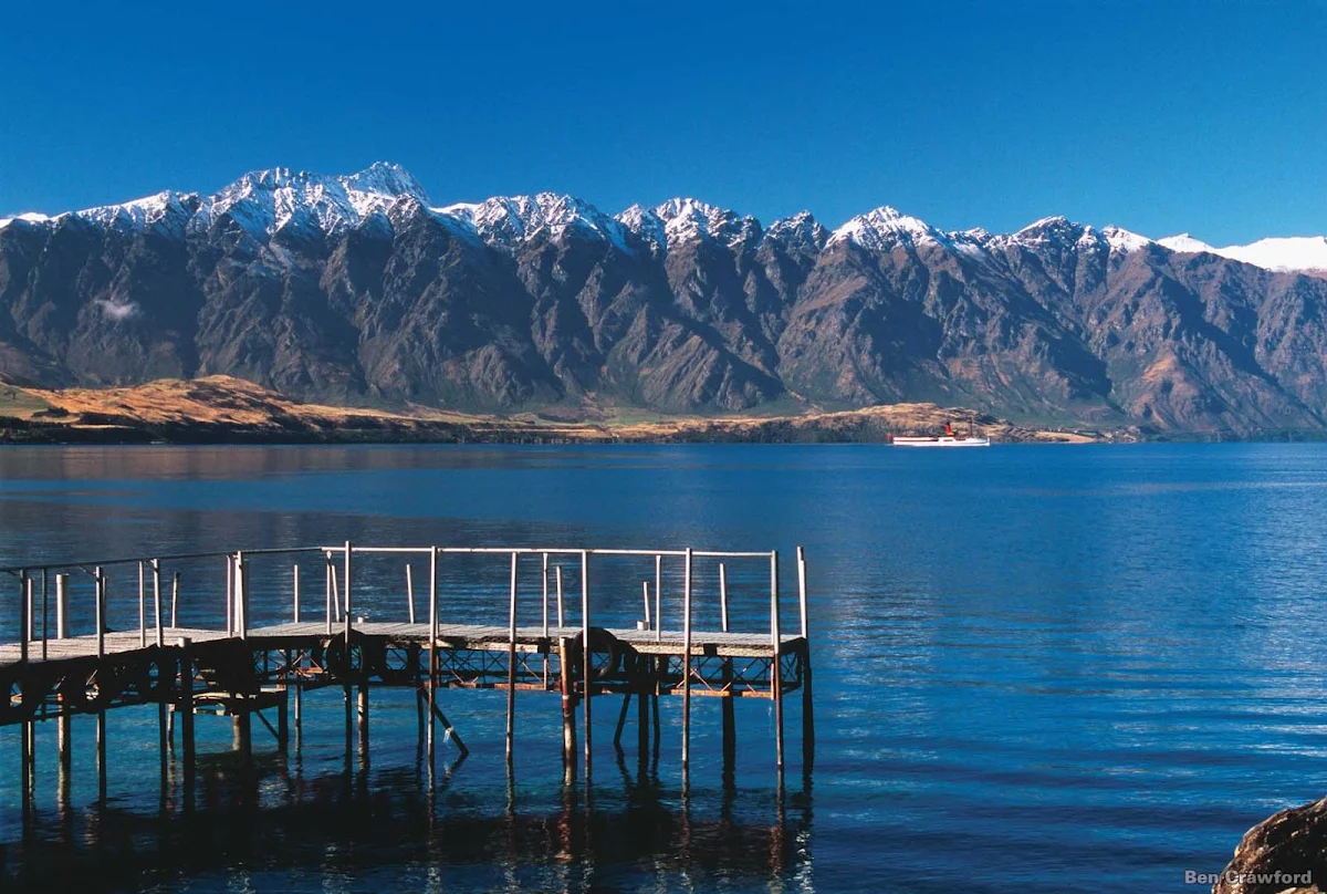 Lake_Wakatipu - The second largest of New Zealand's southern glacial lakes, Lake Wakatipu is nearly 50 miles long and bordered on all sides by glaciated mountains. The highest peak is Mount Earnslaw at 9,249 feet. 