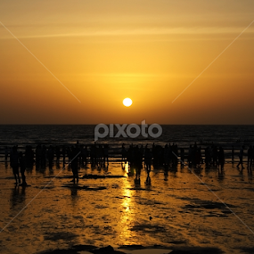 Sunset at Juhu Beach, Mumbai by Pulastyya Phukan - Landscapes Sunsets & Sunrises
