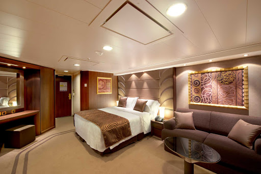 MSC-Divina-Yacht-Club-Suite - Each MSC Yacht Club Suite is located in a private part of the MSC Divina that includes stunning front-of-ship views, king bed (convertible to two singles), marble bathroom with bathtub, 24-hour butler and concierge service and complimentary minibar.