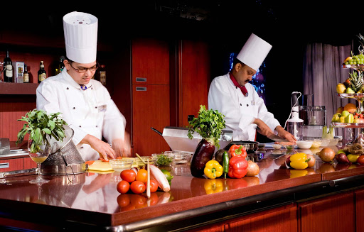 Holland-America-Signature-Class-Culinary-Academy - Holland America Line's Culinary Arts Centers is where intimate, hands-on classes are generally freestyle and cruisers can do as much or as little as they wish while preparing dishes under the chef’s supervision.