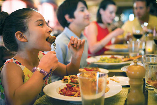 Norwegian-Cruise-Line-dining-LaCucina-girl - Enjoy authentic Italian dishes that the kids will like, too, at La Cucina during your Norwegian Cruise Line sailing. 