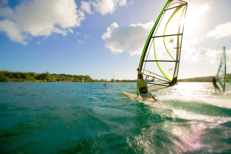 Curacao's strong winds and warm waters are a windsurfer's dream.