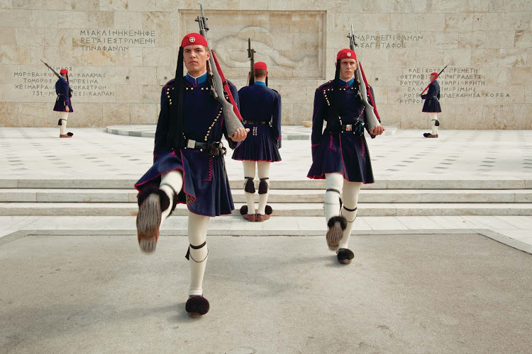 Travel to the Syntagma Square in Athens, Greece, via Seabourn and watch the Changing of the Guard featuring the Evzones in full costume.