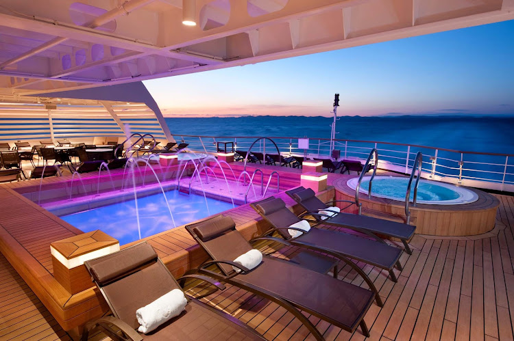 Relax and enjoy the colorful, peaceful indoor pool on the aft deck of Seabourn Odyssey. It's one of five swimming areas on the ship.