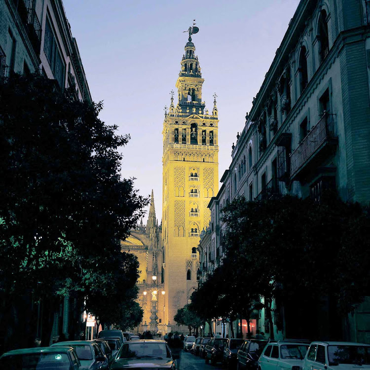 Built by the Moors between 1184 and 1197, this minaret Giralda tower in Seville, Spain, was repurposed and became a bell tower after the Christians' conquest in 1568.