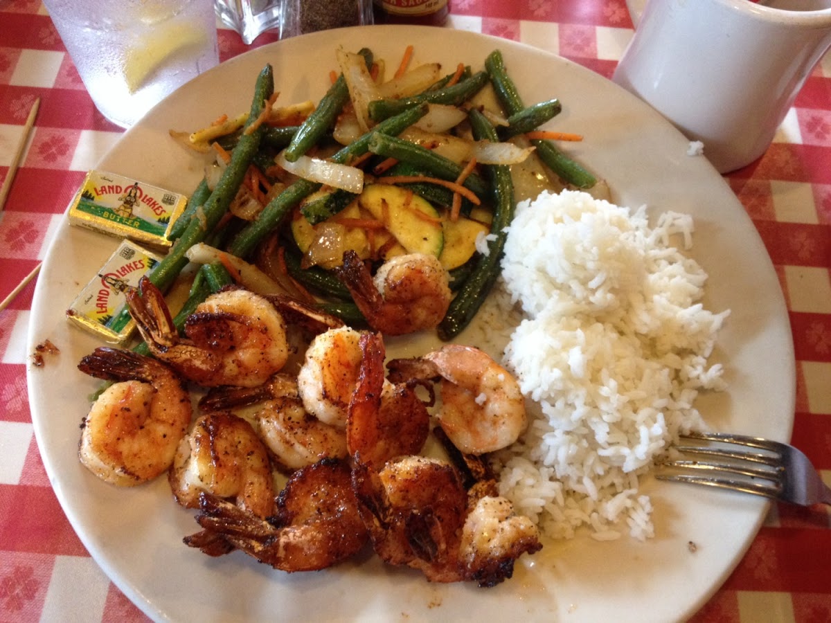Grilled shrimp dinner( they auto sub the rice for the twice baked potato.)