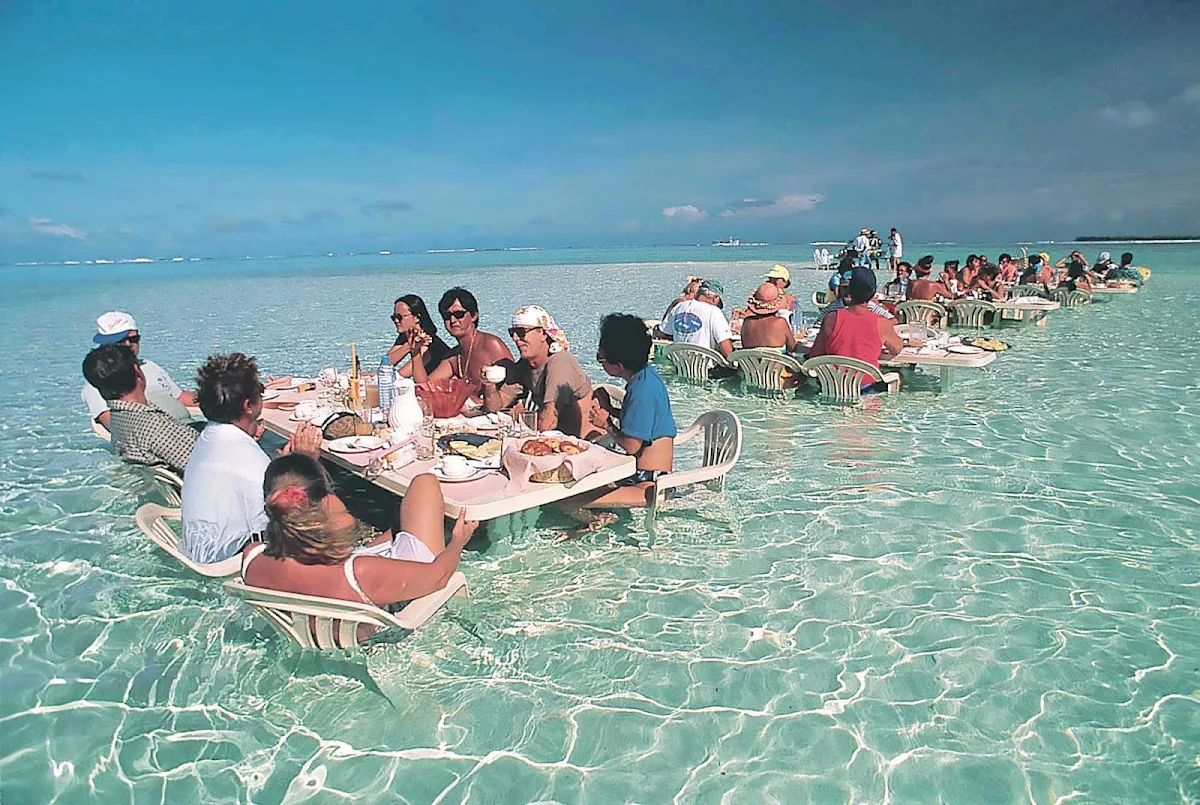 Motu-Picnic-in-Water-BoraBora - The motu picnic part takes place on one of the many small islands or “motu” surrounding Bora Bora's lagoon.