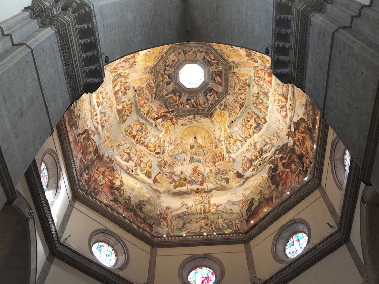 The interior of Florence Cathedral, the landmark 1200s cathedral known for its red-tiled dome.