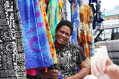 Selling textiles in St. Maarten in the Caribbean. 
 
