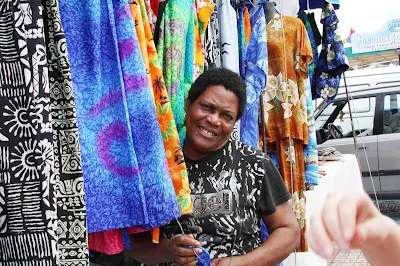 Selling textiles in St. Maarten in the Caribbean. 
 
