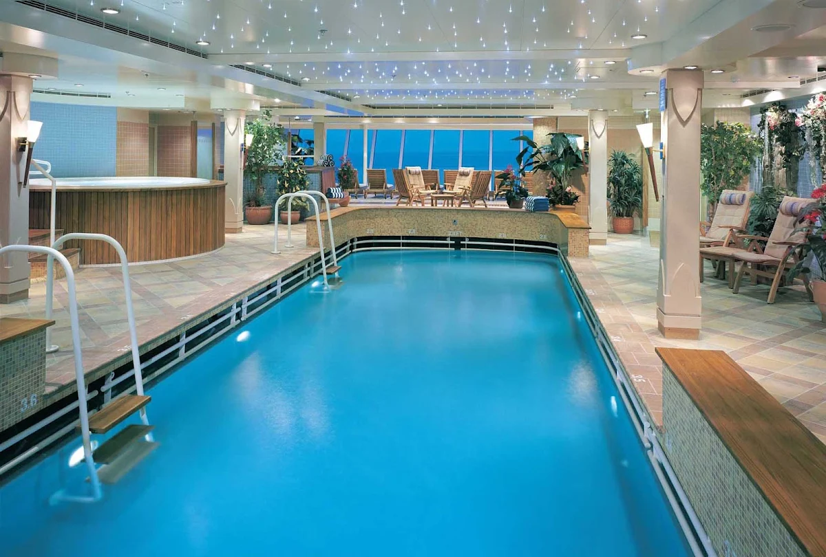 Norwegian-Star-Barong-Fitness-Pool - Get in your daily swim at Norwegian Star's Barong Fitness Pool, then relax on one of the poolside lounge chairs.