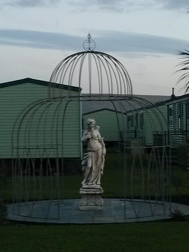 Caged Statue