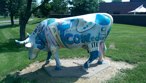Smart Cow Statue