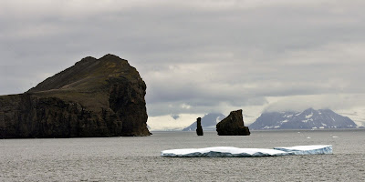 The South Shetland Islands—and a first iceberg—are our first sighting of land after crossing the Drake.