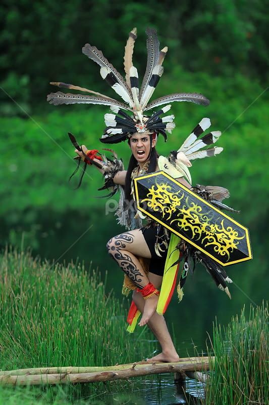 Dayak Warrior by Arif Hidayat - People Portraits of Men