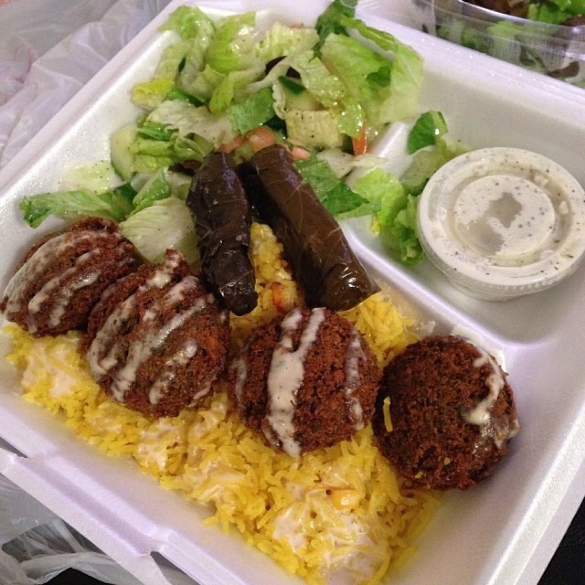Falafel plate with a side of grape leaves. (Their sides are huge!)