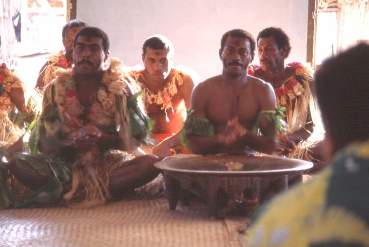 A kava ceremony, this one in the Mamanuca Islands of Fiji. No flash photography was allowed inside during the ceremony.