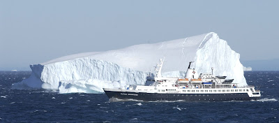 Another cruise vessel  sails past.
