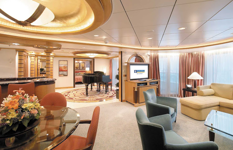 Royal Suites on Adventure of the Seas have a separate bedroom with king-size bed, private balcony with hot tub, concierge service and other luxury amenities