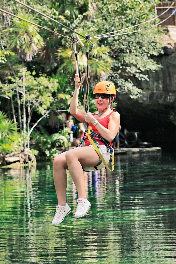 Ziplining in Chikin Ha Park near Playa del Carmen, Mexico.