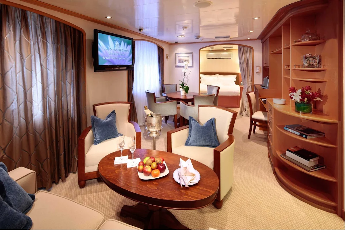 Admiral-Suite-SeaDream - At 375 square feet, the Admiral Suite on a SeaDream ship comes with a separate living and dining area, master bedroom, 1.5 baths and three panoramic windows.