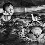 Cathing a ball by Chandra Irahadi -  