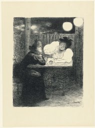 Twee vrouwen drinken absint aan tafel in café