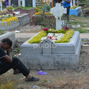 Remembering Someone on Graveyard  by Dipa Chatterjee - People Family