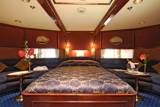 Star-Clippers-Flyer-Owners-Suite - The Owner's Suite aboard the twin clipper ships Star Clipper and Star Flyer offers a king-size bed and room to spread out. 