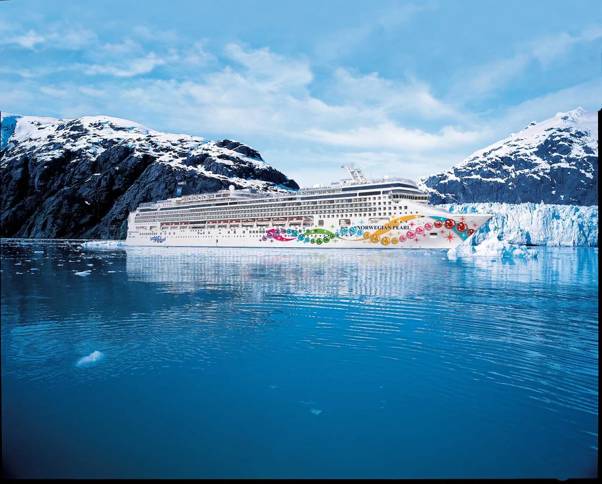 Norwegian-Pearl-Aerial-Alaska - Norwegian Pearl cruising in Alaska's sparkling blue waters.